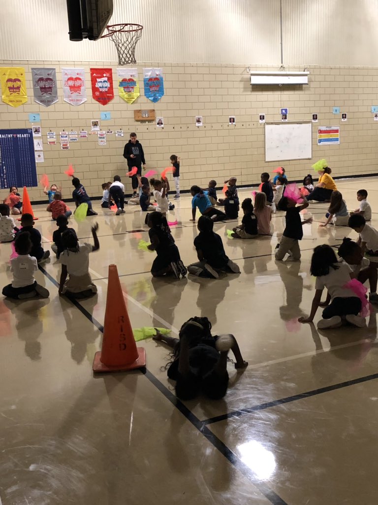 What does PK PE look like on the second day of school? @FLA_COACHB rocked it by partnering them with 1st grade buddies. Love this space! @kellie_sellers1 @katyphinney @ForestLnAcademy #risdsaysomething