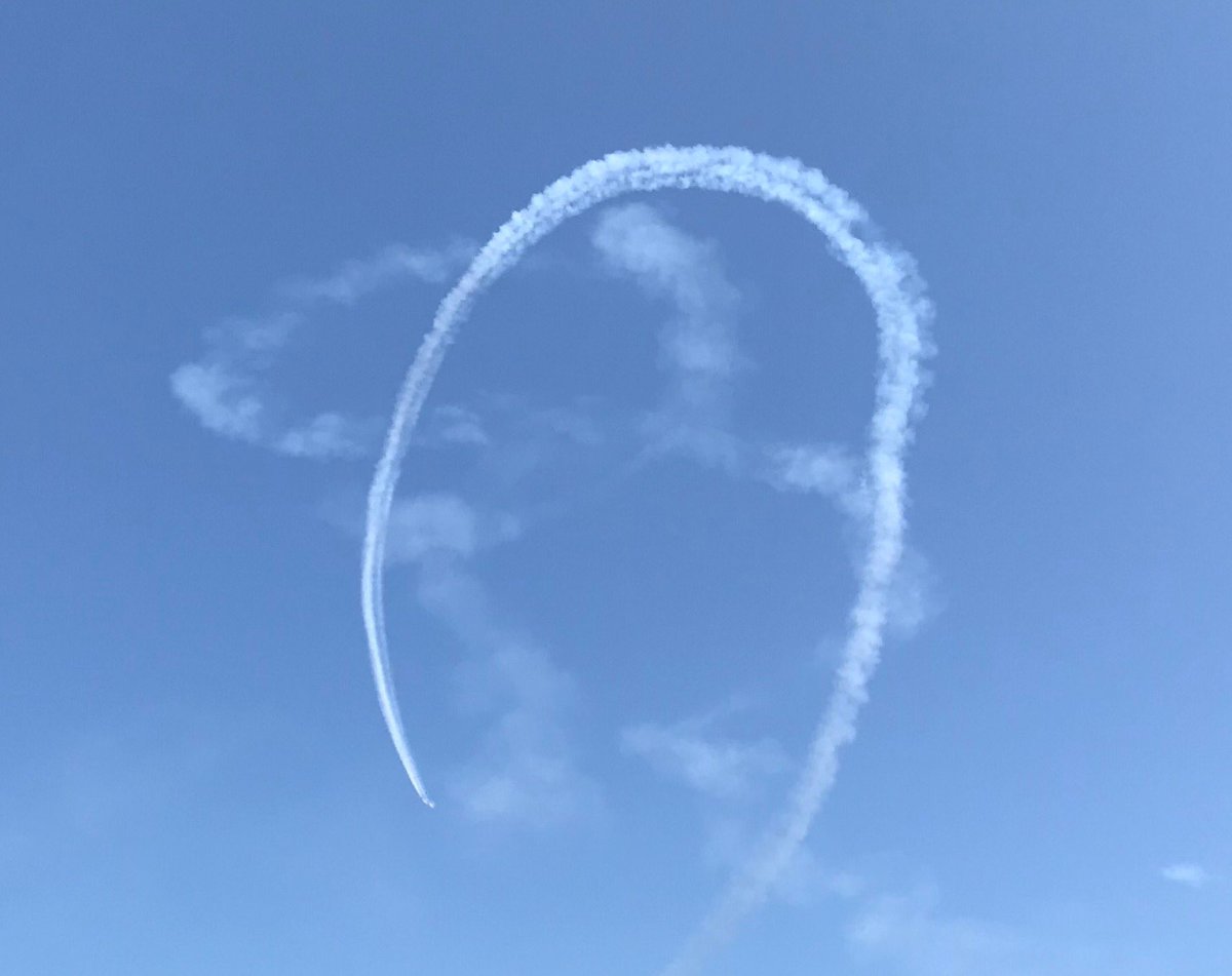 carsonjw's tweet photo. David watching a war bird in town for the #SiouxFalls Air Show and the @AFThunderbirds writing on my neighborhood sky. #powerontheprairie https://t.co/J55HRIK0c7