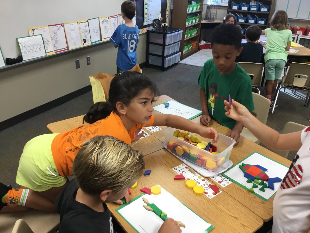Morning activity this week was making shapes with tangrams and getting to know our team. #Raymarsh #teamwork