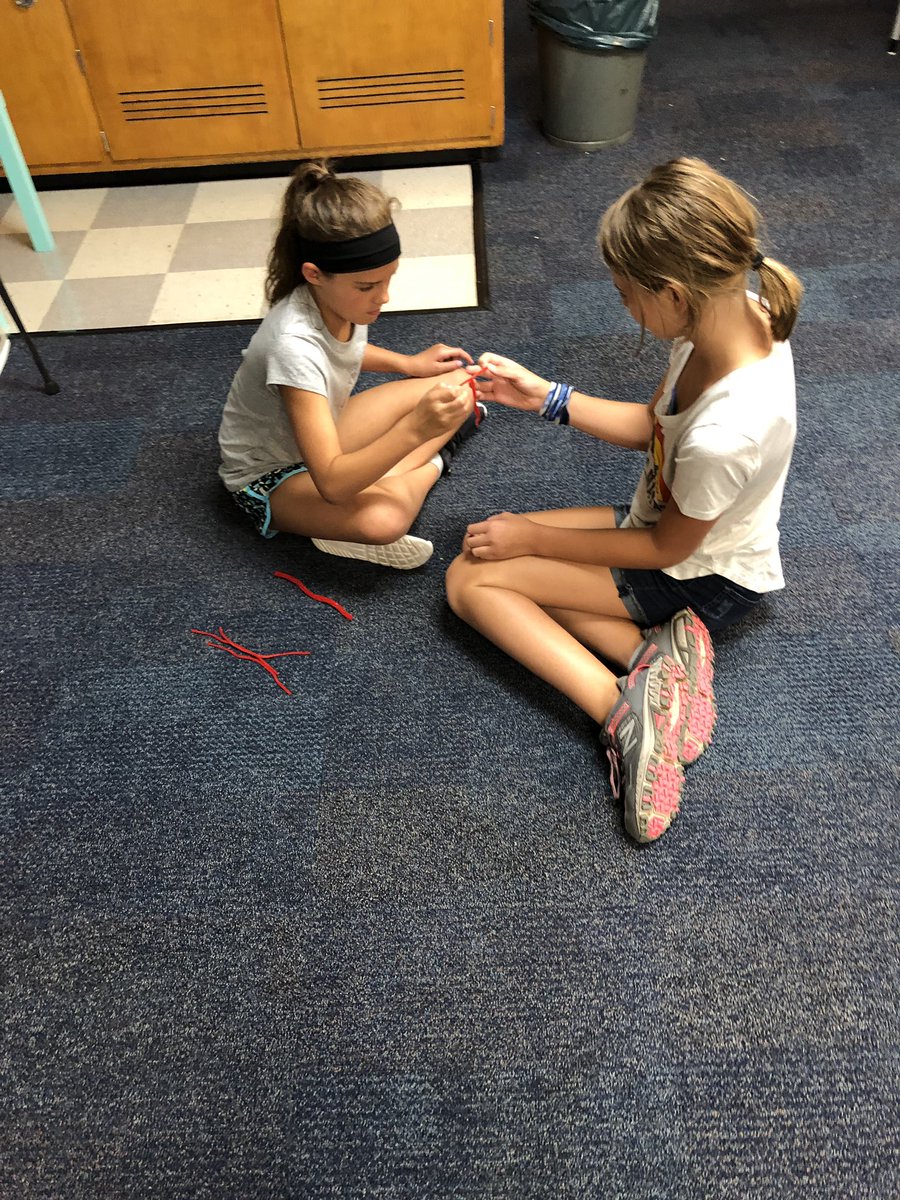 Kenda_Ropp's tweet image. Tying Pull-n-Peel Twizlers with a partner and one hand each is not as easy as it sounds! #teamwork #UVLearn #313teach
