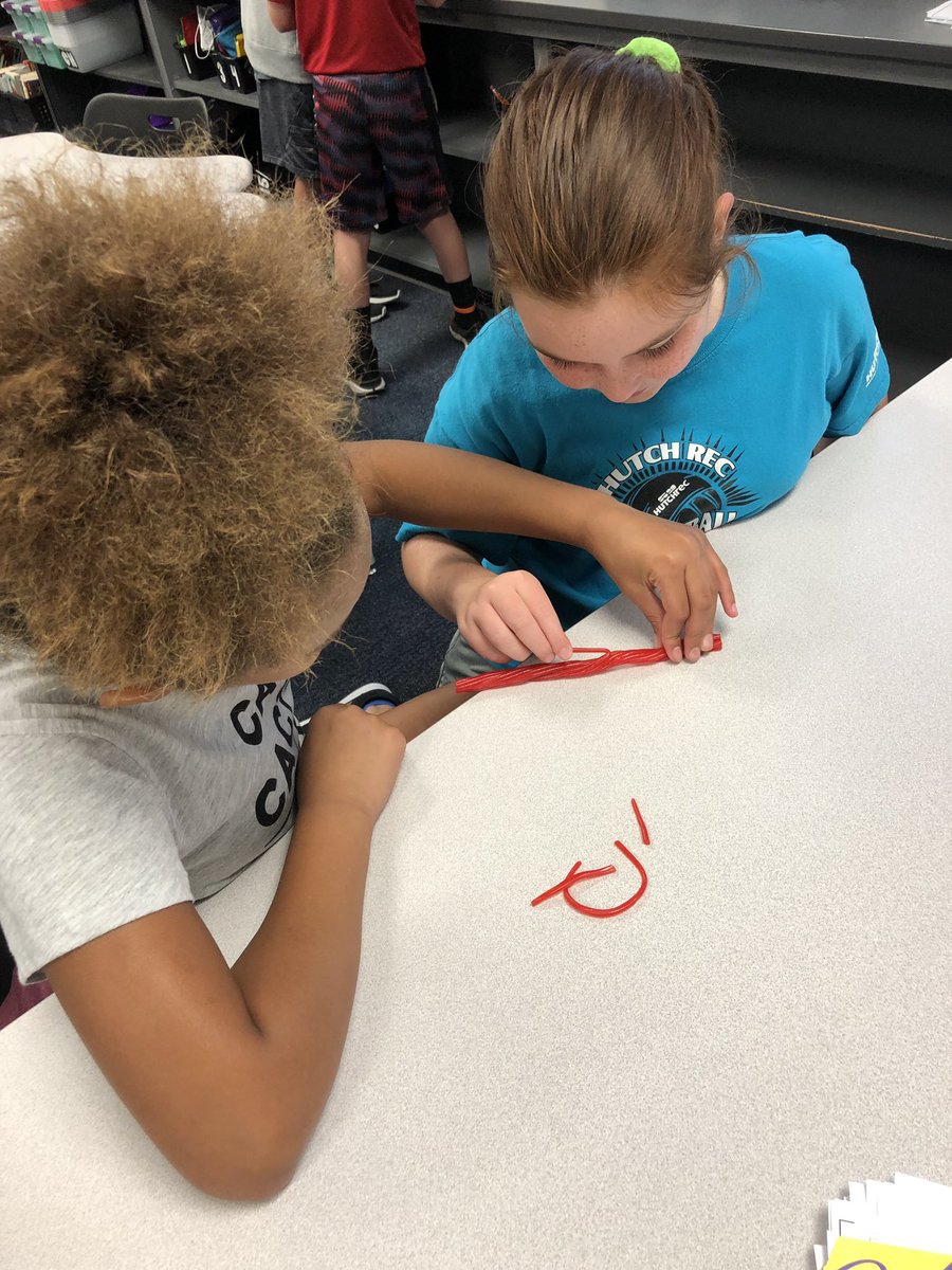 Kenda_Ropp's tweet image. Tying Pull-n-Peel Twizlers with a partner and one hand each is not as easy as it sounds! #teamwork #UVLearn #313teach