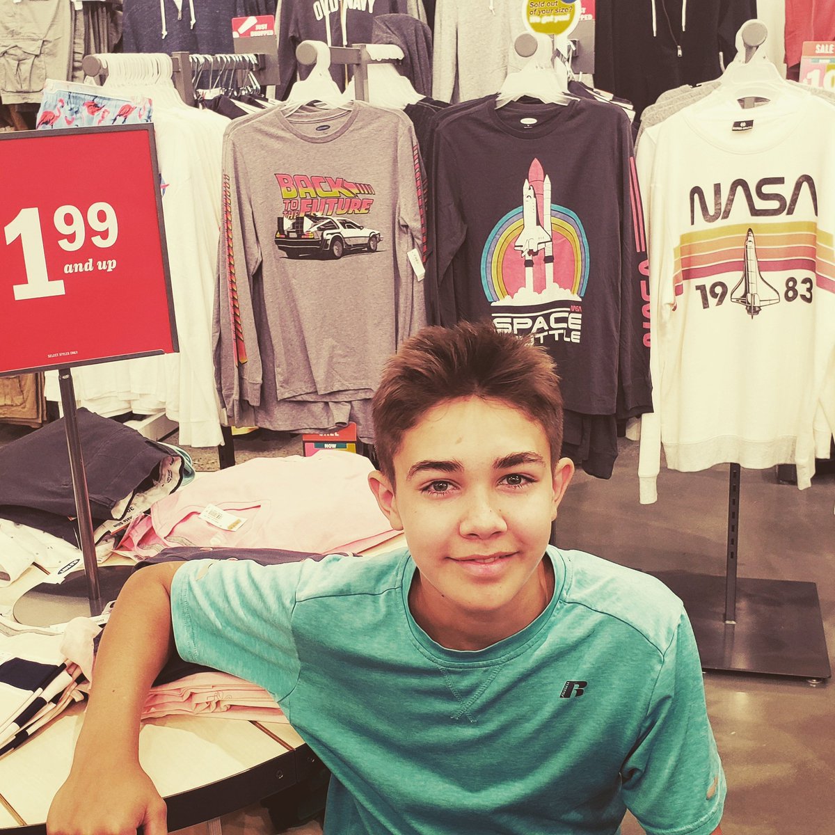 JumpBlue23's tweet photo. I traveled back to th 80's and took this picture! 😉 Crazy how cheap the clothes were back then @OldNavy!!  I love @BacktotheFuture!! I guess @NASA was popular back then too! @OldNavyCA #OldNavyStyle #oldnavy #1980s @80sNostalgia #style #shopping #BackToTheFuture #FlashbackFriday https://t.co/9OuIWNgirg