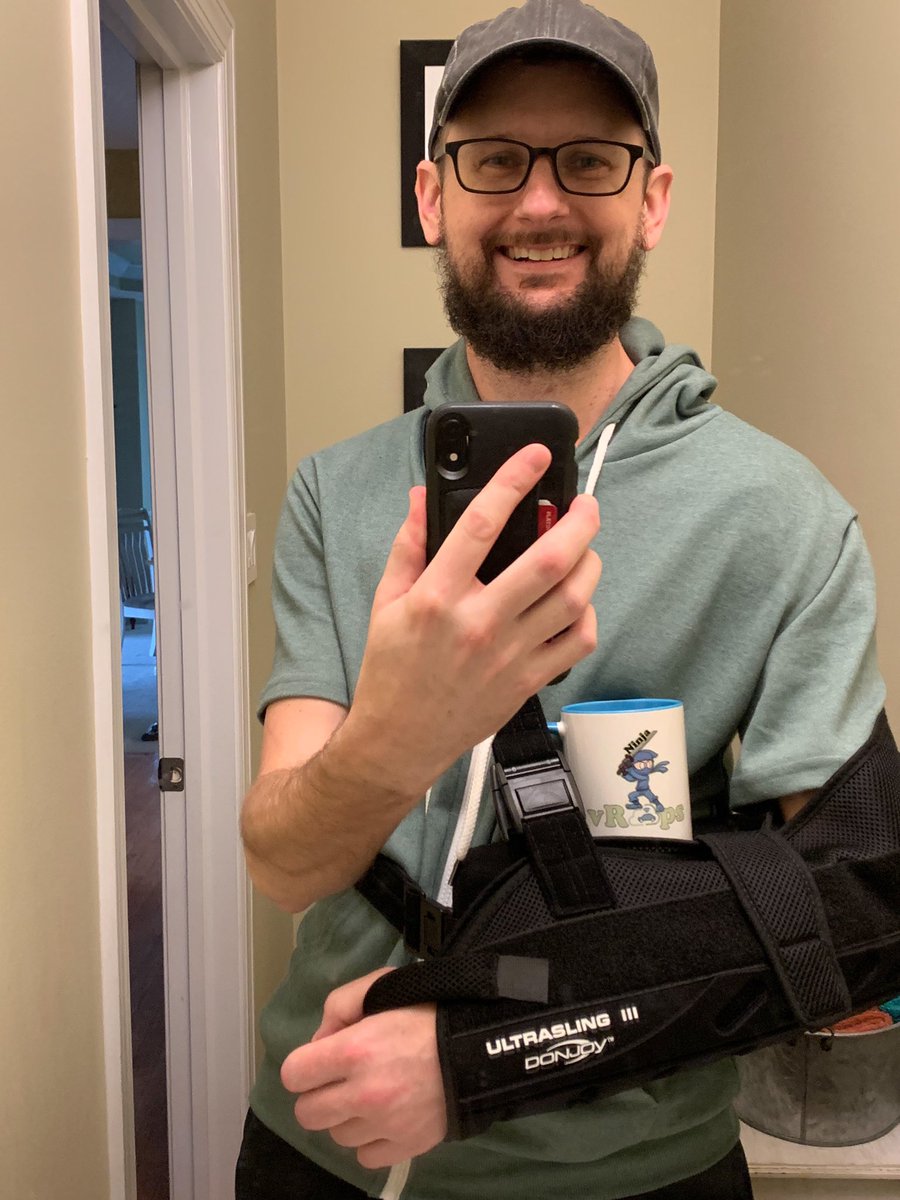 scummins's tweet photo. This shoulder sling makes a convenient shelf for my new @vRealizeOps #vROpsNinja mug 😁Share your dashboard, super metric, or vRO MP workflow at https://t.co/1Qad5EyPVV for one of your own! (Your own mug, that is. I’m gonna need to keep the sling 😛) @johnddias https://t.co/uObDB0Ih7x