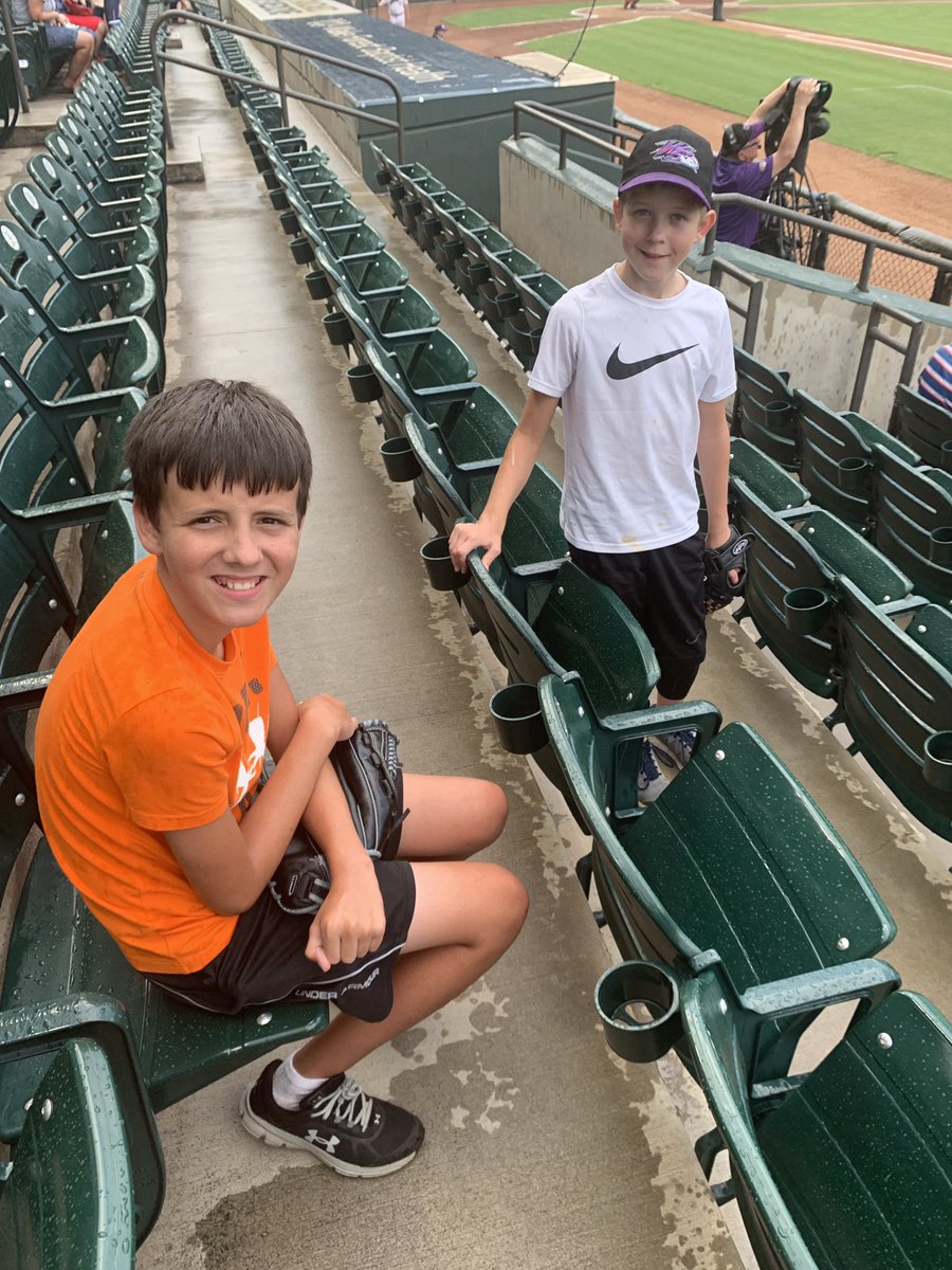 GeriDeac's tweet photo. Didn’t raise no softies! Hanging out in the rain at the Dash game (while their mom ran for cover under the overhang)! #summernights #aintgonnamelt #wsdash https://t.co/CQn7gzpVOY