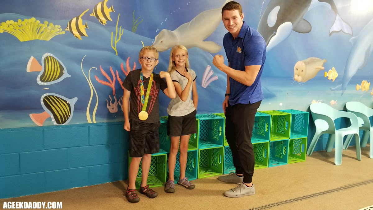 GeekDad248's tweet photo. Flexing their swimming muscles! Olympic gold medal winner @ryan_f_murphy stopped by #GoldfishSwimSchool to give kids some encouragement + thank the @GoldfishSwim community for its support of @SwimFoundation #MakeaSplash: https://t.co/4ri7qnwfSd #GoldfishPartner #FloatItForward https://t.co/TWiox2TWfZ