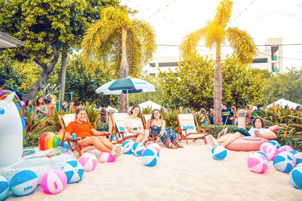 univmiami's tweet photo. Bounce houses and beach balls is how we end move-in week. 🏖🙌🎉
.
#CaneKickoffHouseParty #Toppelfest #umiami #newcanes https://t.co/ZiQfEo9l5x