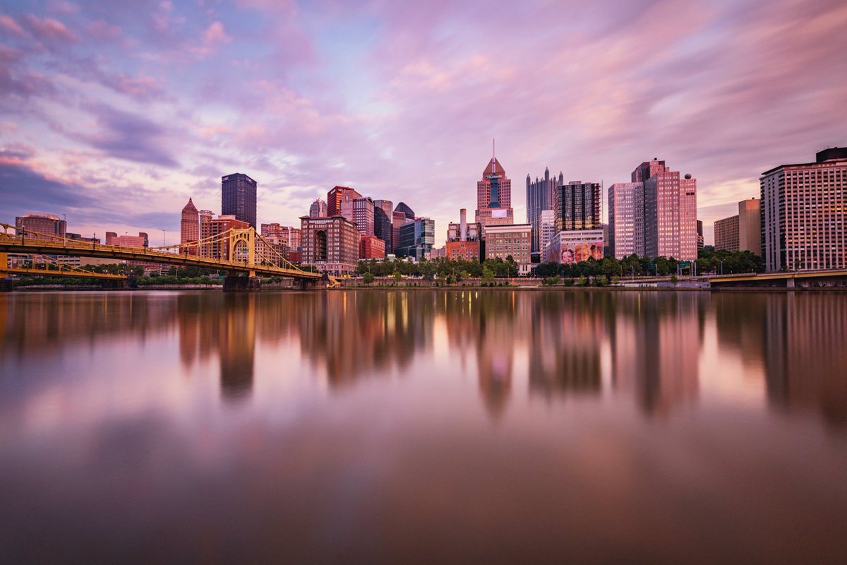 DaveDiCello's tweet photo. A little late, but’s it’s Friday, so everyone is still up, right? This is another long exposure, captured during a beautiful sunset on the North Shore. The clouds were pretty slow moving, so the 3 minute exposure helped more in smoothing the river than creating streaks in the sky https://t.co/vVK5zQrZx2
