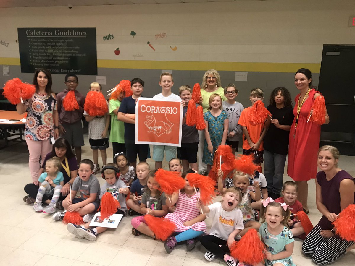 We initiated kindergarten into their houses this week! 5th grade leaders helped welcome them.