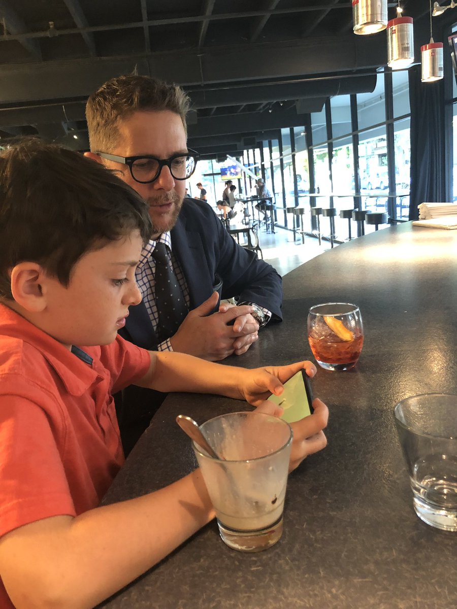 MizReilley's tweet photo. Martin has the best night ever. #simonwho #happyhour #lookserious https://t.co/Jjcx5zZ56G
