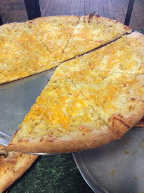 iglicesc's tweet photo. It's a match made in heaven: The weekend and a slice of pizza from Polito's. https://t.co/BxNkRg7Ebm