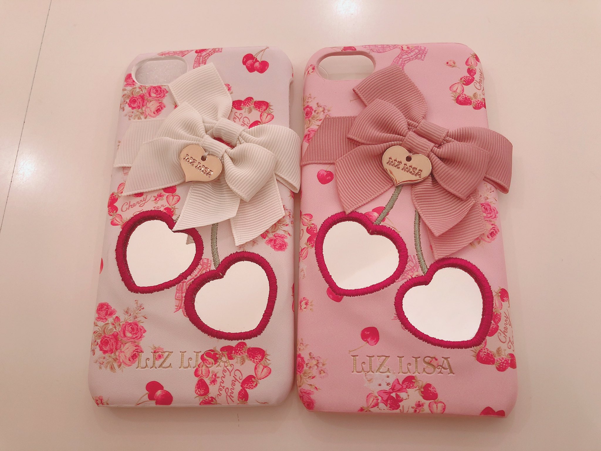 Liz Lisa 近鉄パッセ店 ハートチェリーミラーiphoneケース ミラーになったハートチェリーが 目を惹く Iphoneケースです ベースがテリアチェリー柄になっているのも 見逃し厳禁の可愛いpoint 195 9703 0 4 500 Tax White Pink 対応機種 Iphone6 8 Liz Lisa 近鉄パッセ店 ハートチェリーミラーiphoneケース ミラーになったハートチェリーが 目を惹く Iphoneケースです ベースがテリアチェリー柄になっているのも 見逃し厳禁の可愛いpoint 195 9703 0 4 500 Tax White Pink 対応機種 Iphone6 8