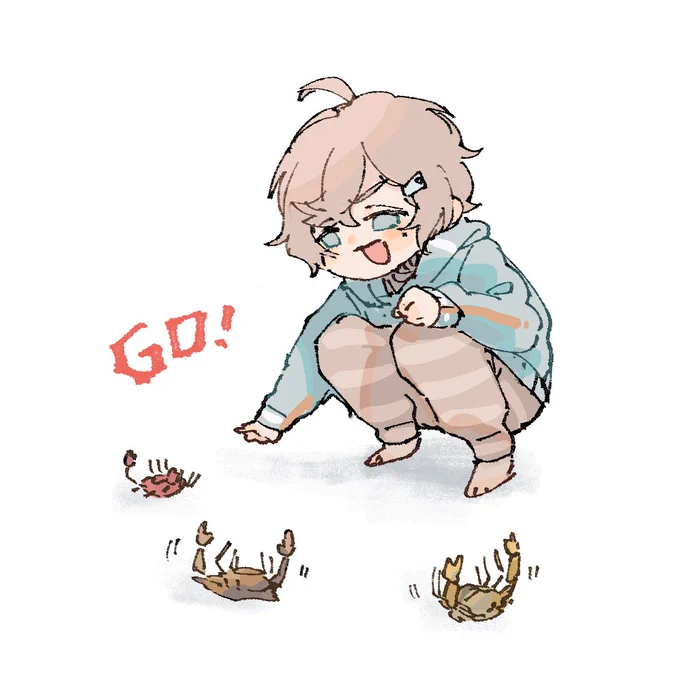 カニをひっくり返して遊ぶかなえくん 