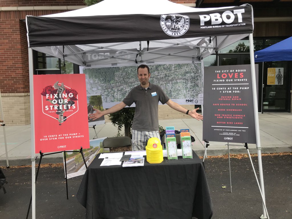 PBOTinfo's tweet photo. We’re so excited to celebrate #MultnomahDays with you, #Portland! PBOT staff will be at our tables and available to chat from now until 5 pm. Grab a #FixingOurStreets hat for your kiddo or play plinko with friends. We’ve got great swag to share! #ilovemultnomahvillage https://t.co/zcOv8oozEv