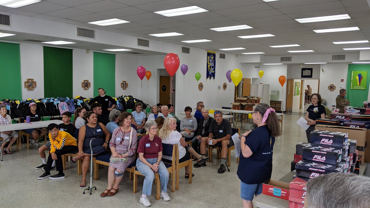 richardleesd's tweet photo. Final preparations and volunteer briefing for today's Back-to-School Bash are well underway.  300+ Backpacks, shoes, haircuts, games, crafts and much more ready to go https://t.co/TwQtCarHxr