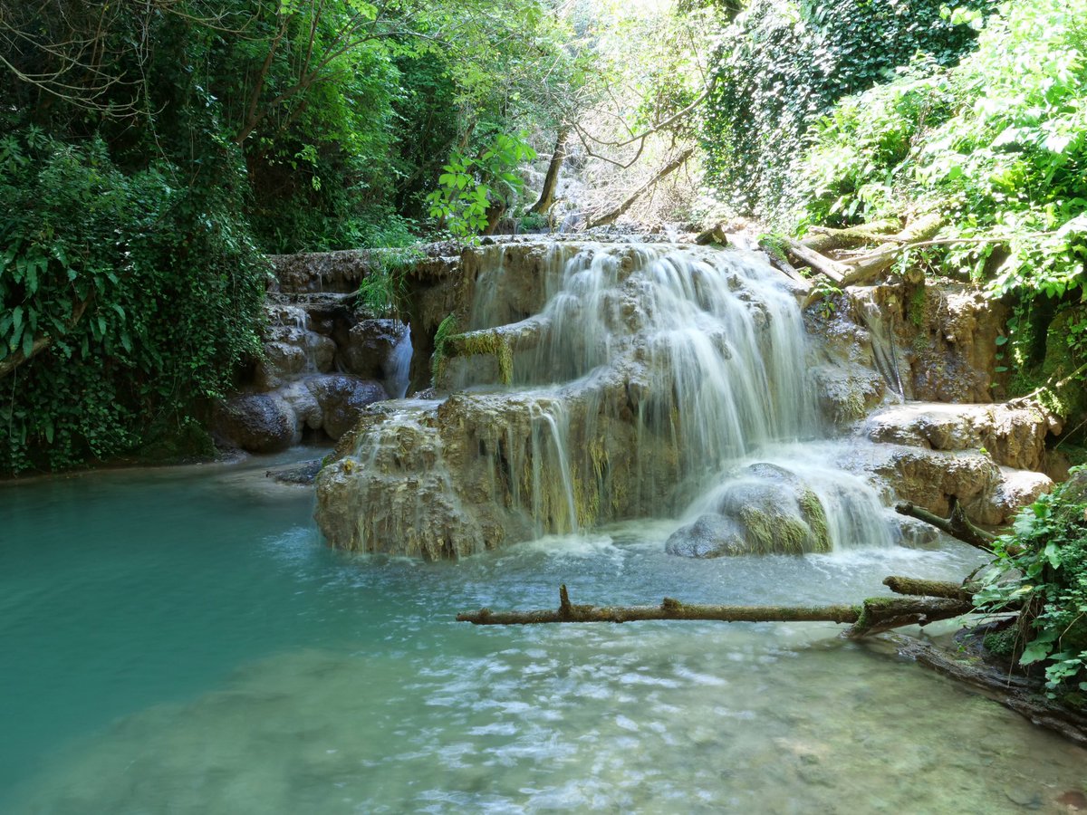 doctorhelgi's tweet photo. Todayβs postcard is from the #Krushuna falls in Northern #Bulgaria. The river comes out from a mile long subterranean cave-lake and cascades down the hill forming platforms of limestone pools, milky blue from the mineralised water. https://t.co/t2L9d6Tee6