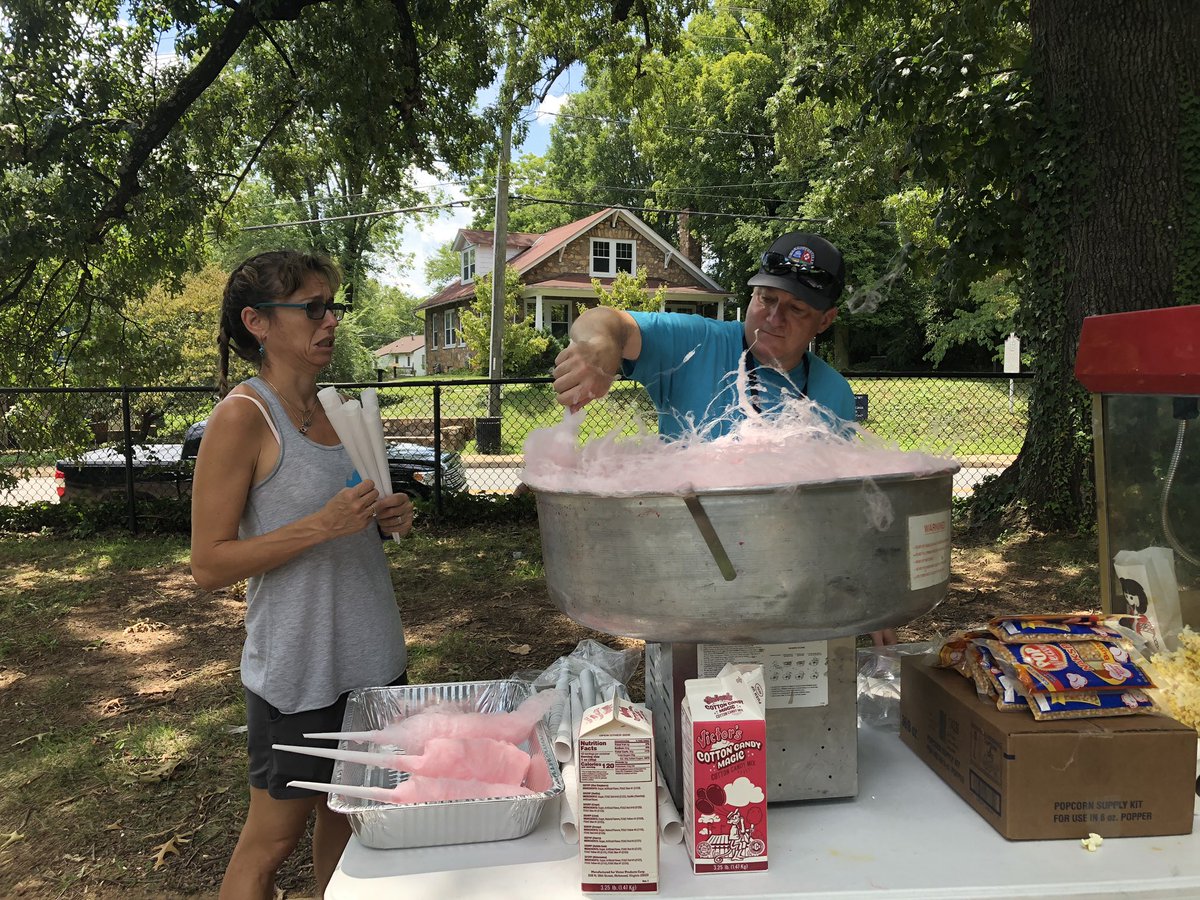 CvilleCityHall's tweet photo. Brian Wheeler is making cotton candy here at our Family Block Party for #UnityDayscville https://t.co/mT9sxvOcQQ