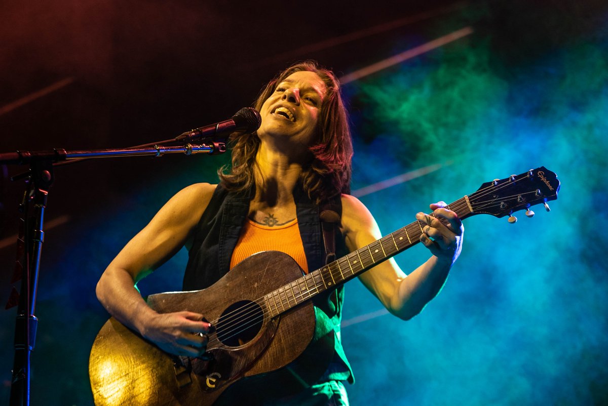 🎶 I do it for the joy it brings 'Cause I'm a joyful girl 'Cause the world owes me nothing And we owe each other the world 🎵 – @anidifranco #rockymtnfolksfest