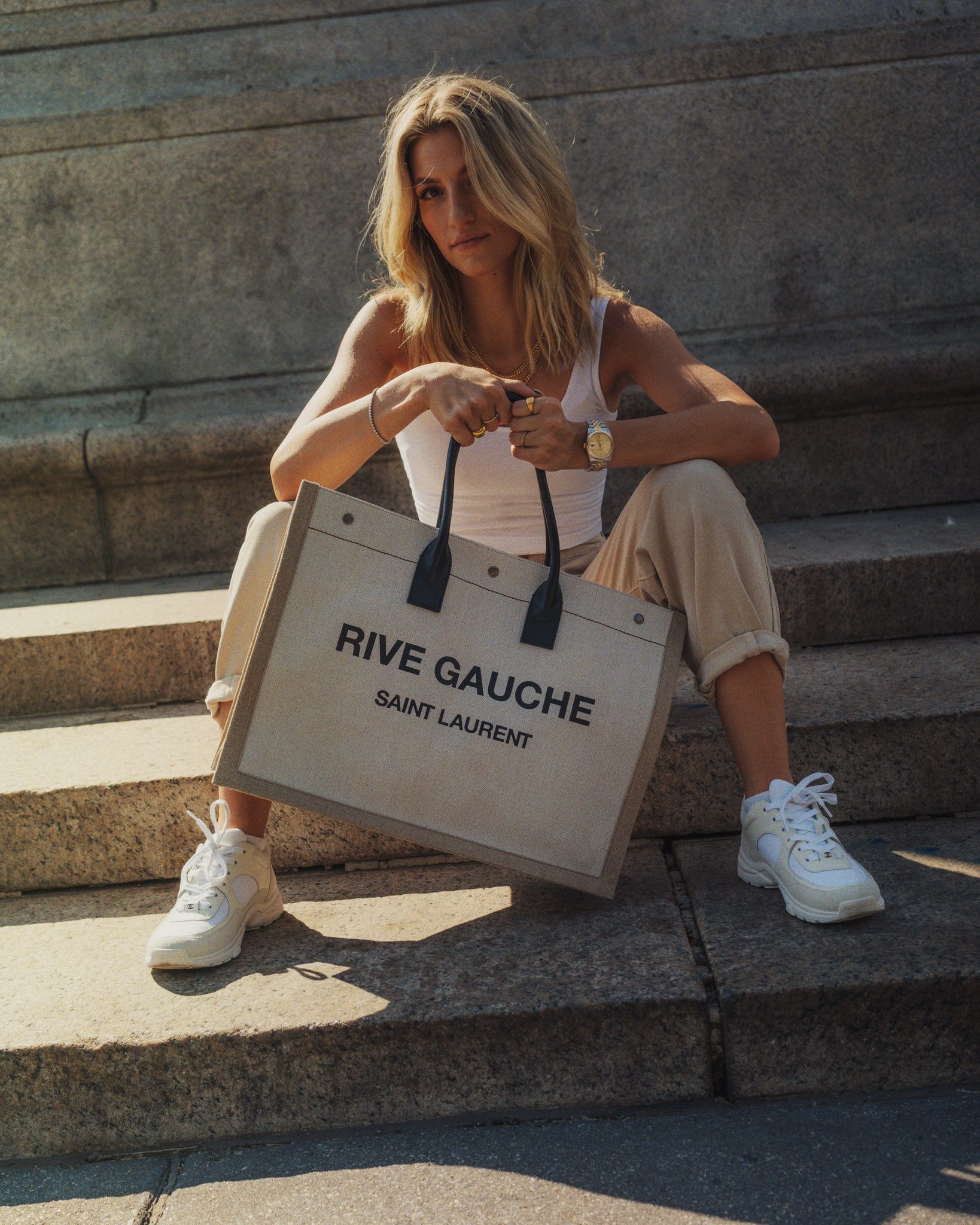 StockX on X: Let the Saint Laurent Rive Gauche Tote be your go-to summer  bag. Pair it with Chanel low top trainers for an easy weekend fit.    / X