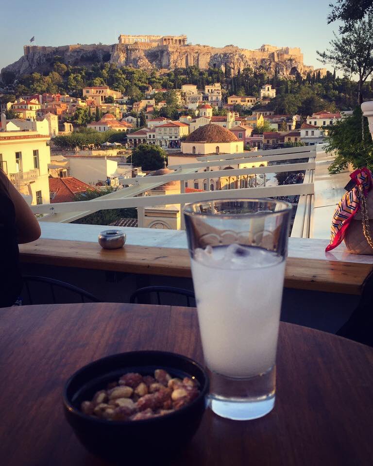 ToulasTake's tweet photo. Exactly one year ago today I was drinking ouzo on an Athens rooftop and taking in a view of the Acropolis in the distance. 
My Montreal balcony has an amazing view, but it doesn’t beat this... #MissingGreece https://t.co/mcRvTTl9c7