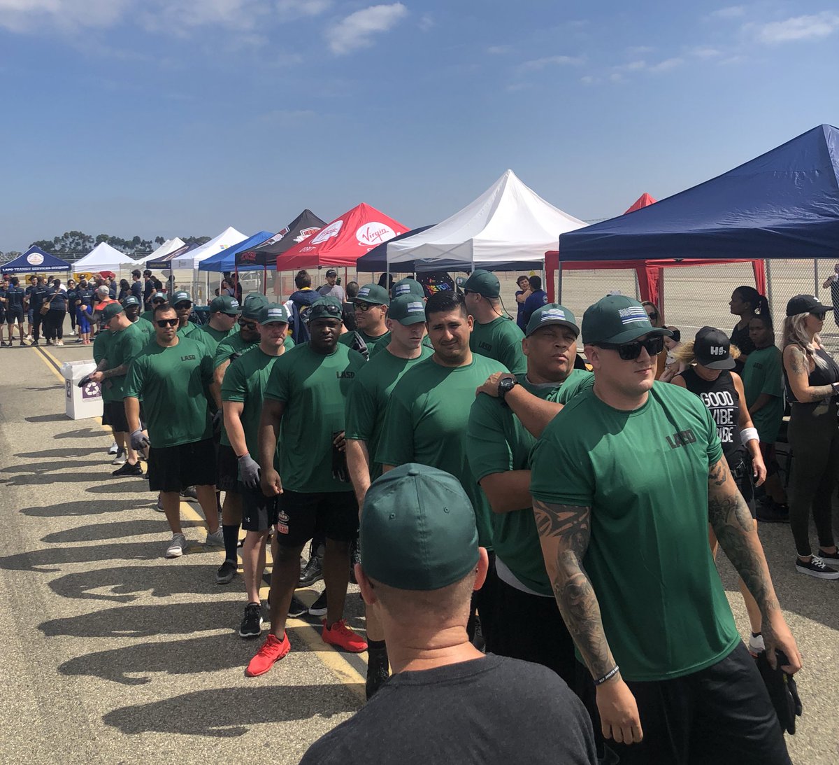 LASDSergio's tweet photo. You know you have a winning team @letr4sosc plane pull when @LAPDChiefMoore stops to take a picture with you. Great event for a great cause today in Long Beach #LETR #SOSC #SOSCPlanePull #WeAreSOSC #LETR4SOSC https://t.co/3zoNQ1upaW
