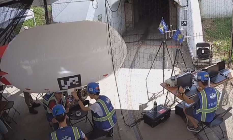 BotJunkie's tweet photo. Don't worry, Team NCTU's blimp will totally fit in the tunnel @nctu_t @DARPA #SubTChallenge https://t.co/qz3dsRj5cM