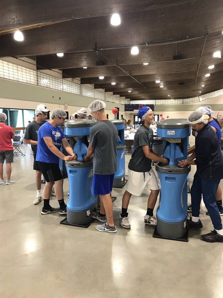 WCAFootball's tweet photo. FMSC-FeedtheNeed. These guys came out after practice this afternoon and help feed 153 kids for the entire year! ALL IN! https://t.co/EuAHqkjwBW