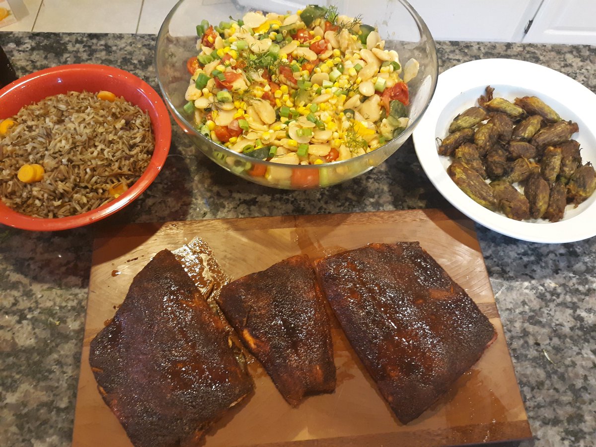 ManilanH's tweet photo. I'm going to be honest y'all I don't think I have it in me to make fry bread. But here is our finished manoomin, succotash, stuffed squash blossoms,  and maple glazed salmon!  #NativeCooking #IndigenousInspiration https://t.co/cqebZYbEQG