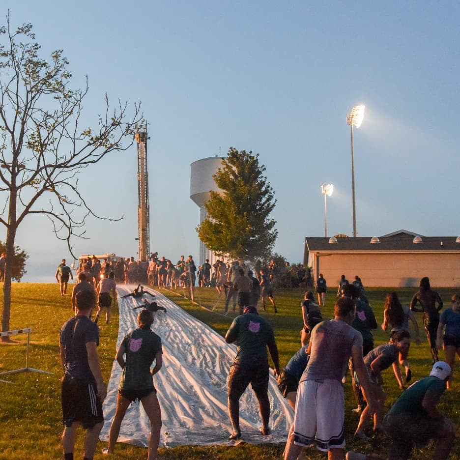 TaborCollege's tweet photo. Thanks to our Student Activities Board, Freshmen slid into the weekend (after a long day of service and orientation) with a color and shaving cream fight and a slip and slide! 

#tc2023 #freshmenorientationweekend https://t.co/6NopB9ruIs