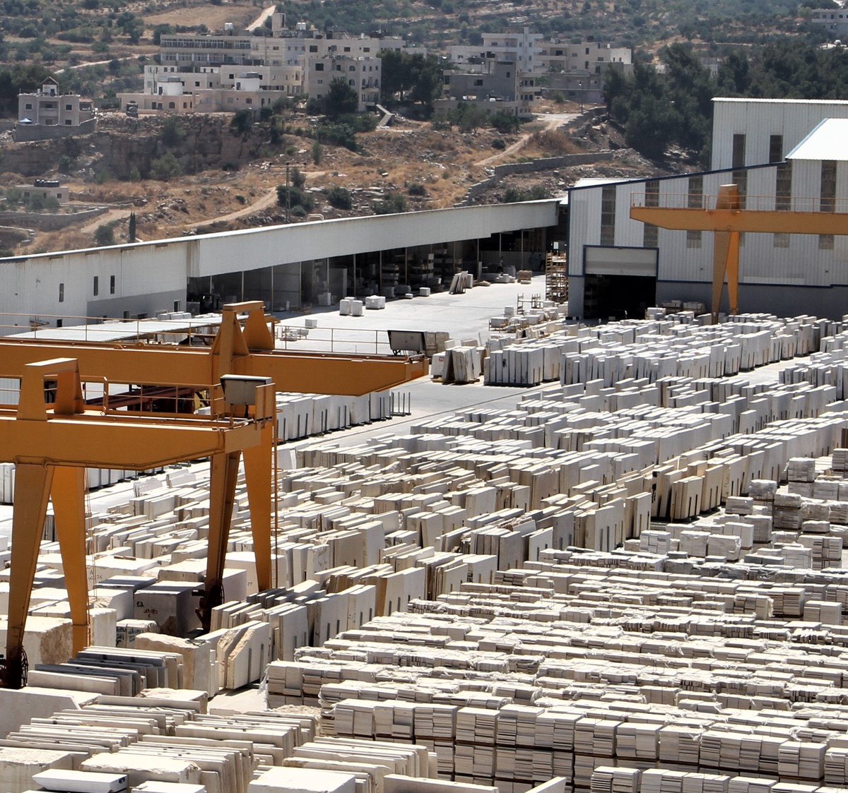 NassarStone's tweet photo. Our facilities in Bethlehem, Amman and Muscat, occupy a space of 380,000 m2 and equipped with the highest machinery and technology. Nassar Stone annually produces more than 2 million sq.m. of finished stone slabs and tiles. #nassarstone #jerusalemstone #global #photooftheday https://t.co/0YlTAHjXLf