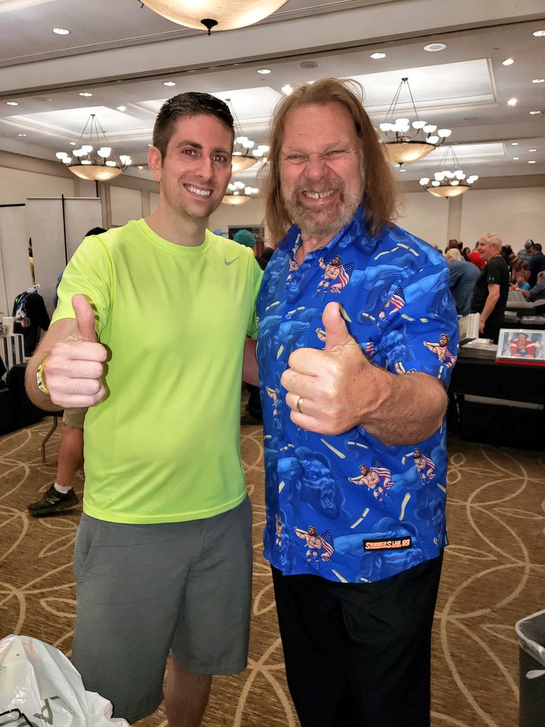 MarkBdk's tweet photo. Me &amp; @OfficialHacksaw at @GatheringTmart yesterday in Charlotte. One of my favorites as a kid getting to meet was awesome. Both him &amp; his wife are very kind and sweet people to talk with. Btw loved your Summerslam 89 shirt Hacksaw! 👍 #Hoooooooooo #USA #OldSchool #ProWrestling https://t.co/pLd0fIdqU9