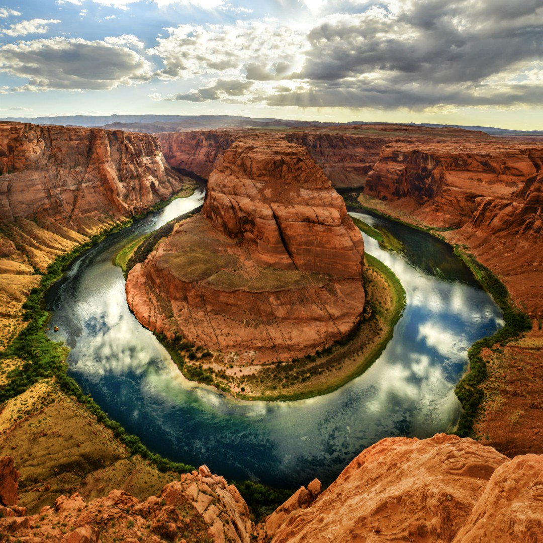 Interior's tweet image. The Colorado River makes a dramatic statement at Horseshoe Bend in Glen Canyon National Recreation Area. Pic courtesy of Josh Packer #Arizona #FindYourPark