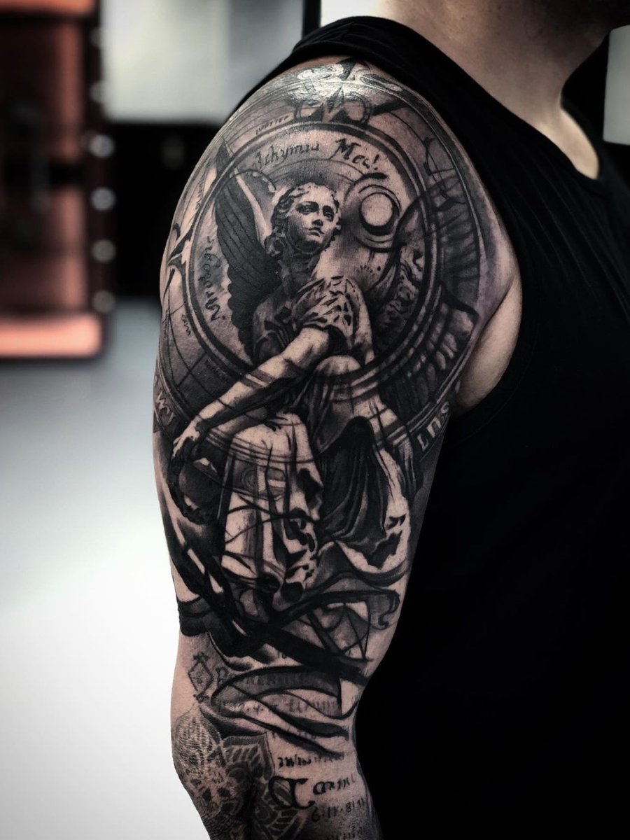 Back center  shoulders The large guardian angel tattoo