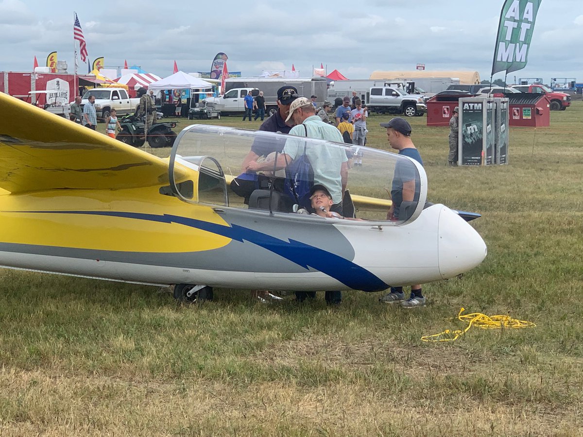 SDWingCAP's tweet photo. Youngsters check out the SDWG’s glider at the Sioux Falls Air Show. #powerontheprairie https://t.co/ETkwp4XxFE