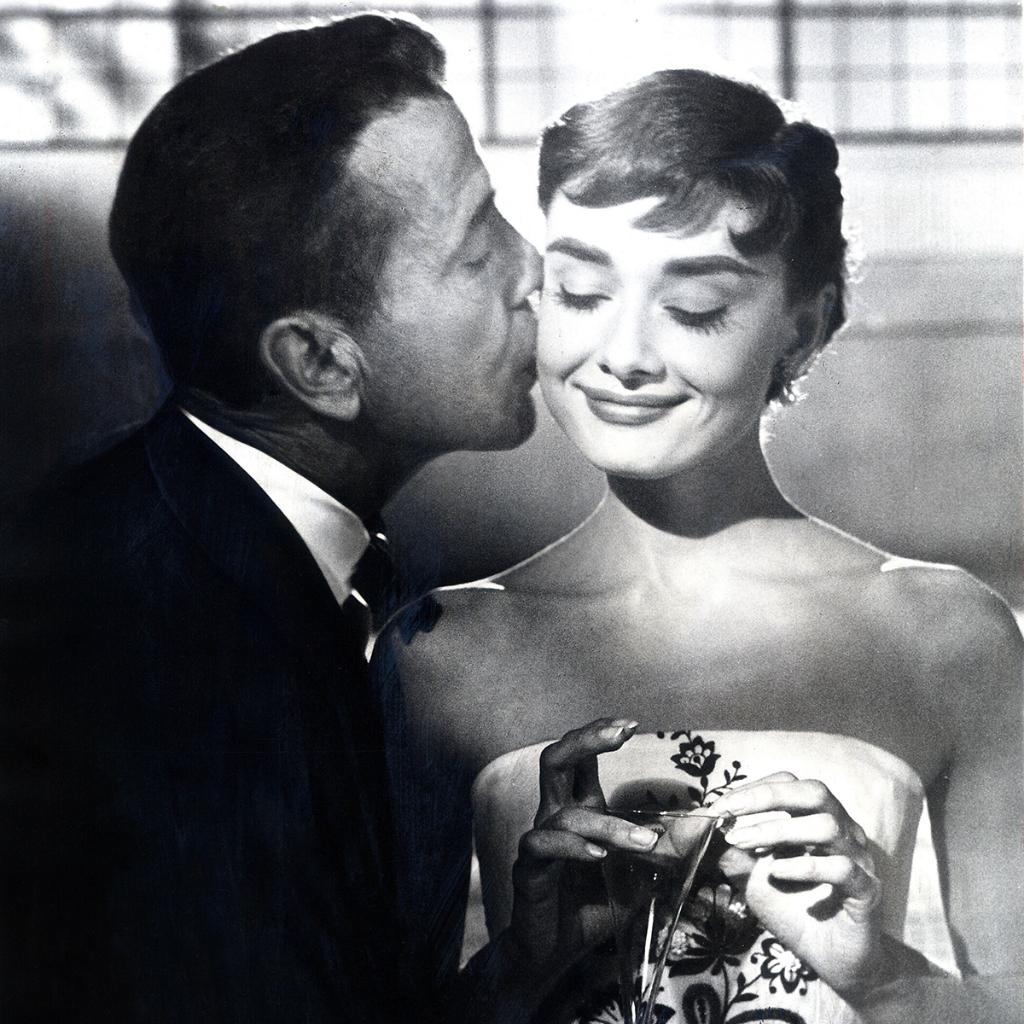 tcm's tweet photo. Audrey Hepburn and Humphrey Bogart in SABRINA ('54) #SummerUnderTheStars https://t.co/e7Rjod8VNC