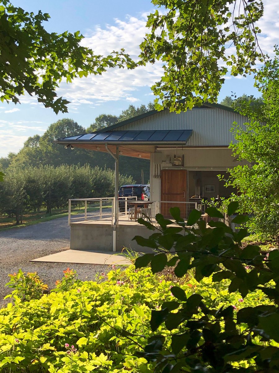 MissyBabinchak's tweet photo. Thank you ⁦@FoggyRidgeCider⁩ for a lovely visit, I could sit in the on the crush pad, looking out over your orchard, and read all day!  Saw black bear near property too!  ⁦@jbabinchak89⁩ and I will be back!!  #virginia #ciderhouse https://t.co/pRxWg5k2XL