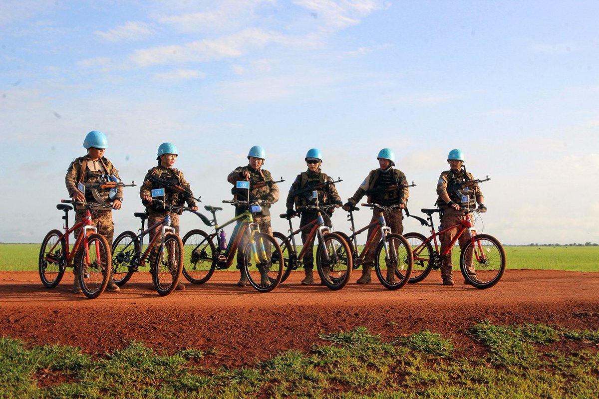 unmissmedia's tweet photo. Protecting civilians and promoting peace by any means necessary, #UNMISS peacekeepers serving with the Mongolian battalion in Bentiu take to the road to Pariang and patrol on bicycles! https://t.co/QwwCTHlIIk