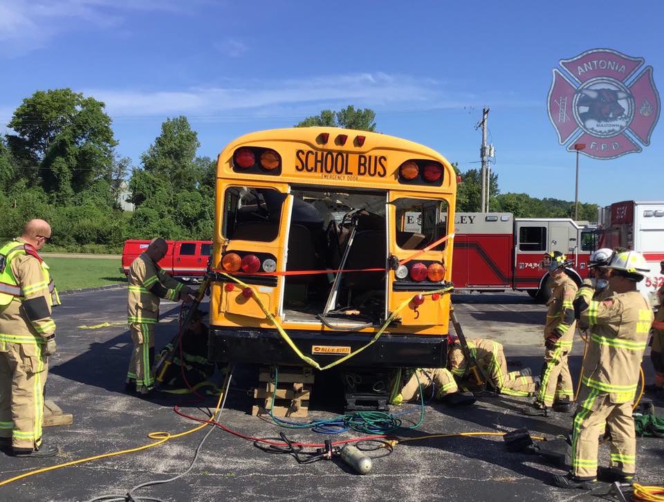 This past month, crews from Antonia Fire have been doing mutual aid training with @svfpd74 over school bus extrication. These photos show the process of using air bags, stabilizer bars, and cribbing to lift and stabilize a school bus if involved in an accident.