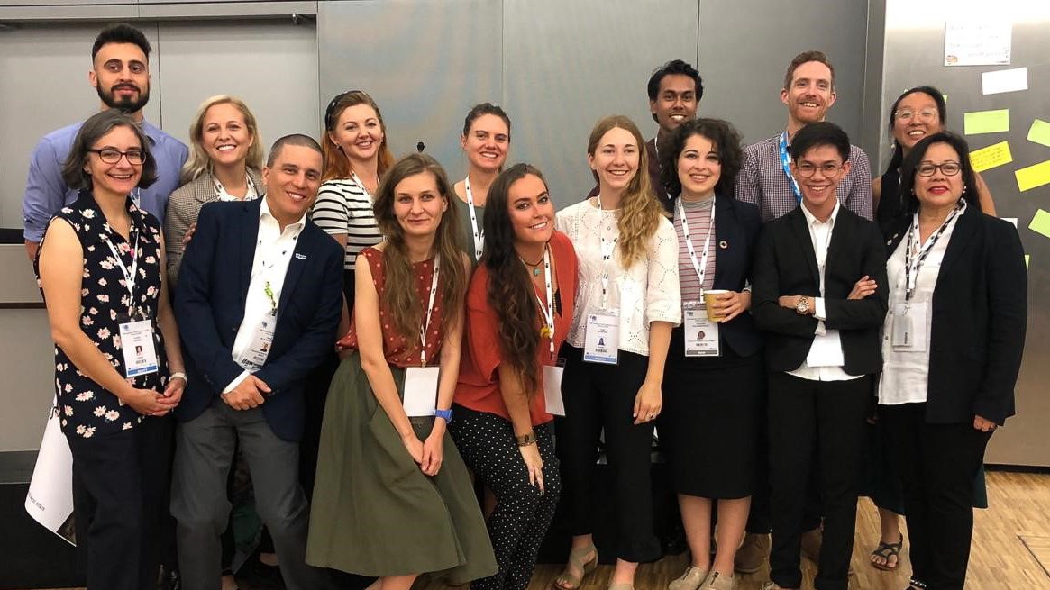 A group of people pose for a photo