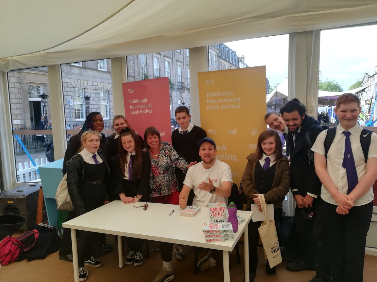 Libraryholyrood's tweet photo. Holy Rood's finest mingling after the event with Steven Camden. "Amazing',"Inspirational" and "an experience I will never forget!" said our pupils. https://t.co/1gbDdRtF7R