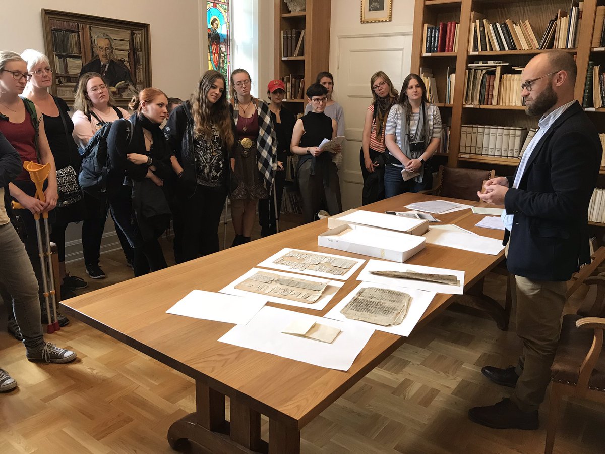 arnamagnaean's tweet photo. Andreas Manhag at @museet shows fragments from Lund Cathedral. #amss2019 https://t.co/EnzQMYD0GI
