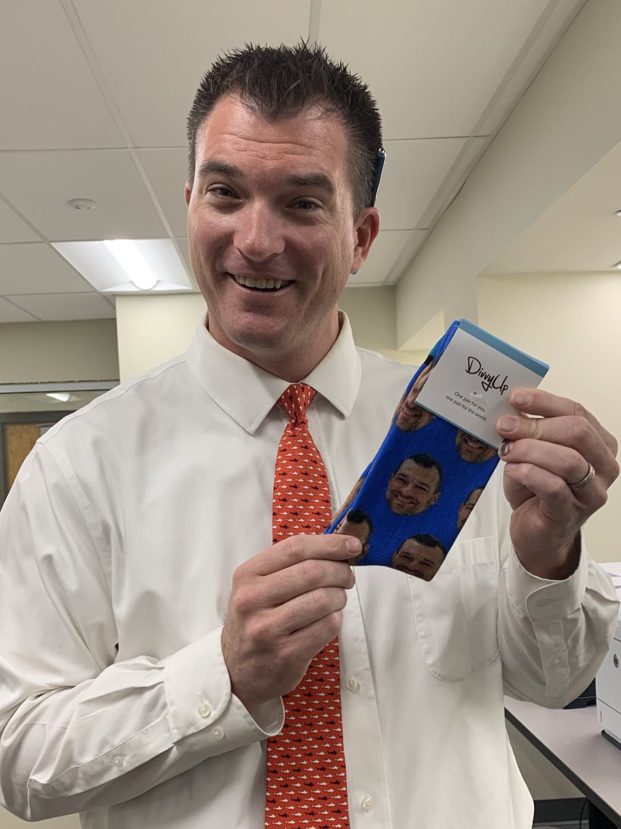 LillianSchuElem's tweet photo. When you talk about your learning from @Wes_Kieschnick and #BoldSchool and then take your team to #MSC2109 and then your teachers have socks made by @DivvyUpSocks with Weston’s face on them... you wear them! #LSsharks @RigorRelevance https://t.co/bcAipIlRsT