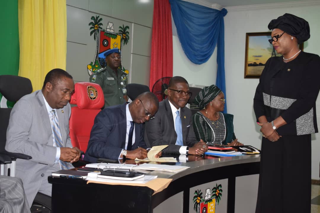 Gov. Sanwo-Olu presenting certificate to the New Permanent Secretary for Ministry of Justice. Congratulations to Ms. Titilayo Shitta-bey.