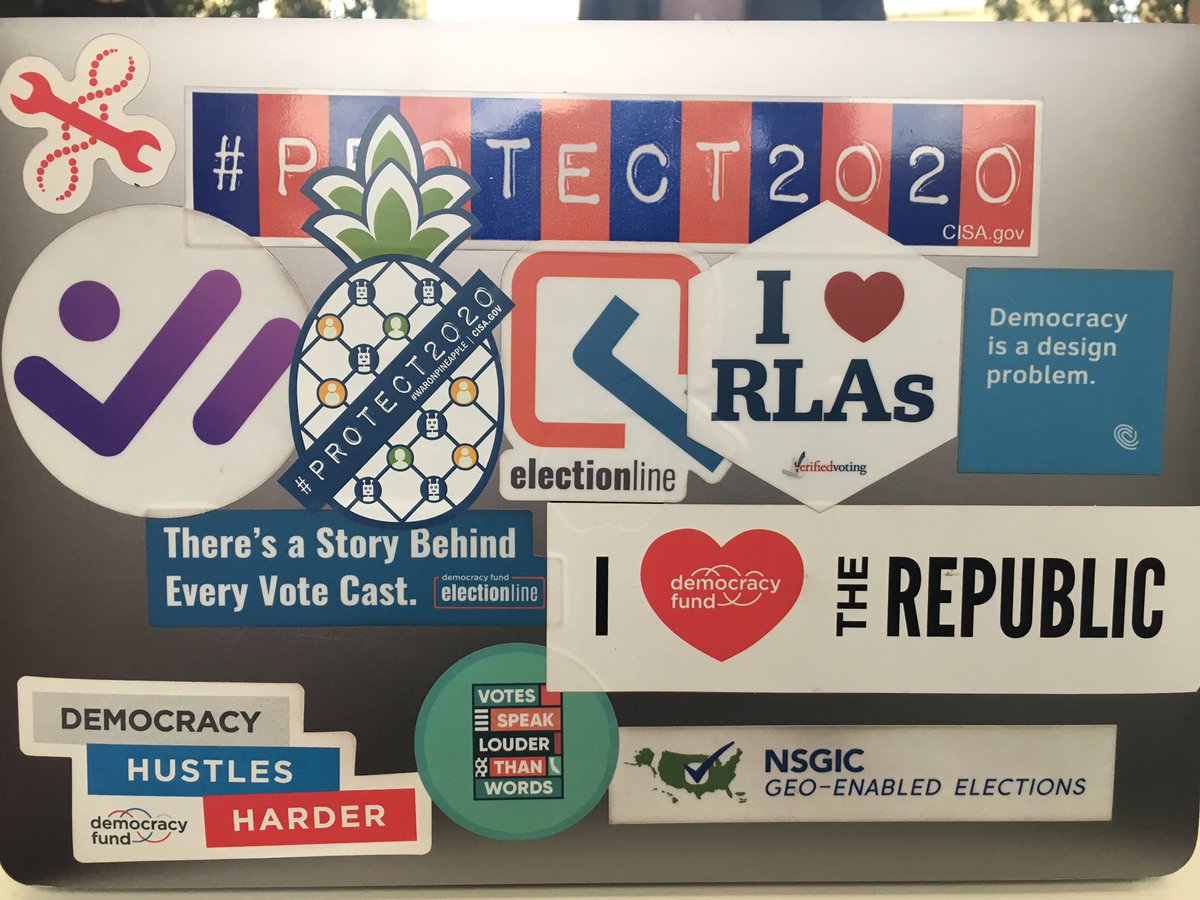 votinggeek's tweet photo. I spy something new on my laptop! Proudly displaying my #propineapple stance! Thanks @CISAgov @mastersonmv for bringing the goods to @ElectionCenter2! https://t.co/9Q3YUrWcIc