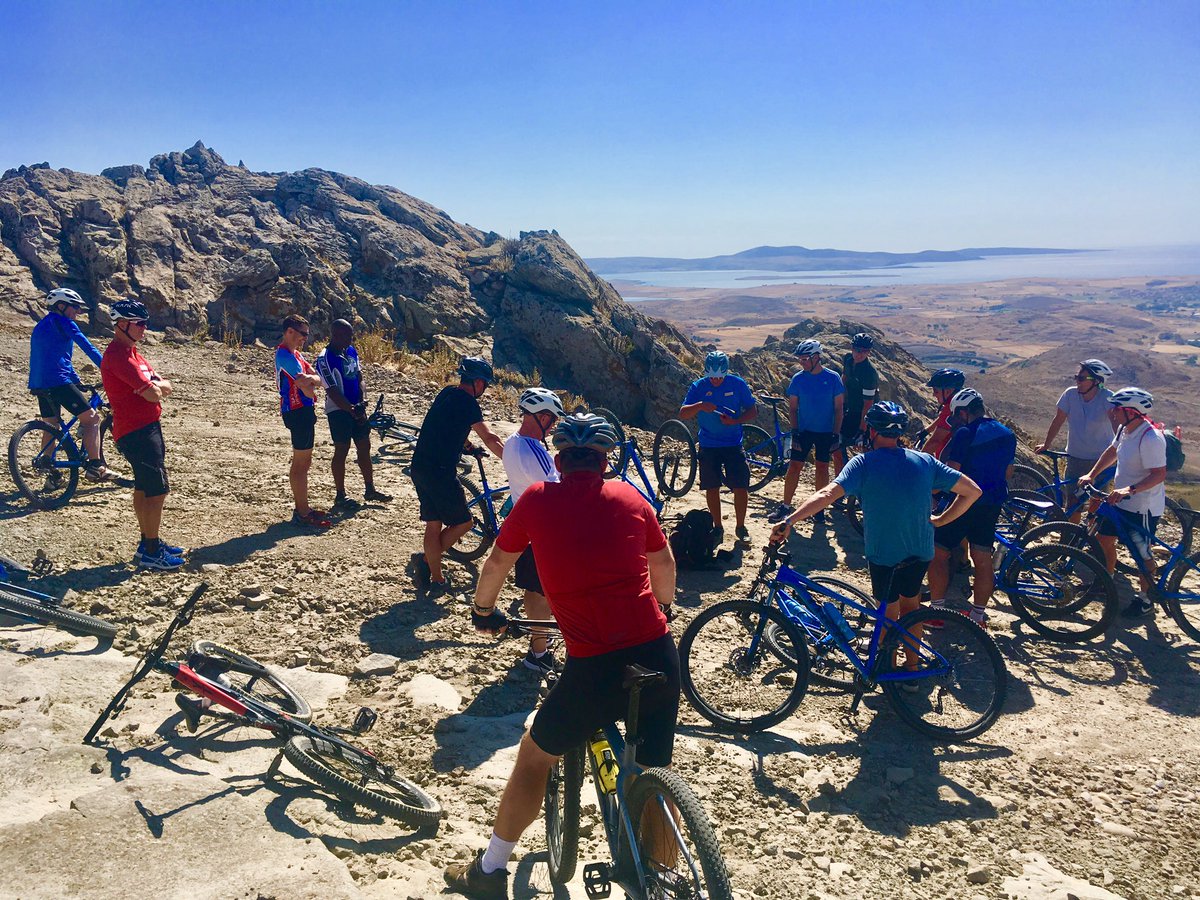 Our Fantastic Head Bike Guide Calvin here, changing a flat tyre today on our lovely 'Summit about Lemnos' ride. But also teaching the guests little tips at the same time!! #MTB #MoutainBiking 
#NeilsonBiking #DownHillThrills #BigClimb <a href="/NeilsonLemnos/">Neilson Portomyrina Palace Beachclub</a> @NeilsonHolidays