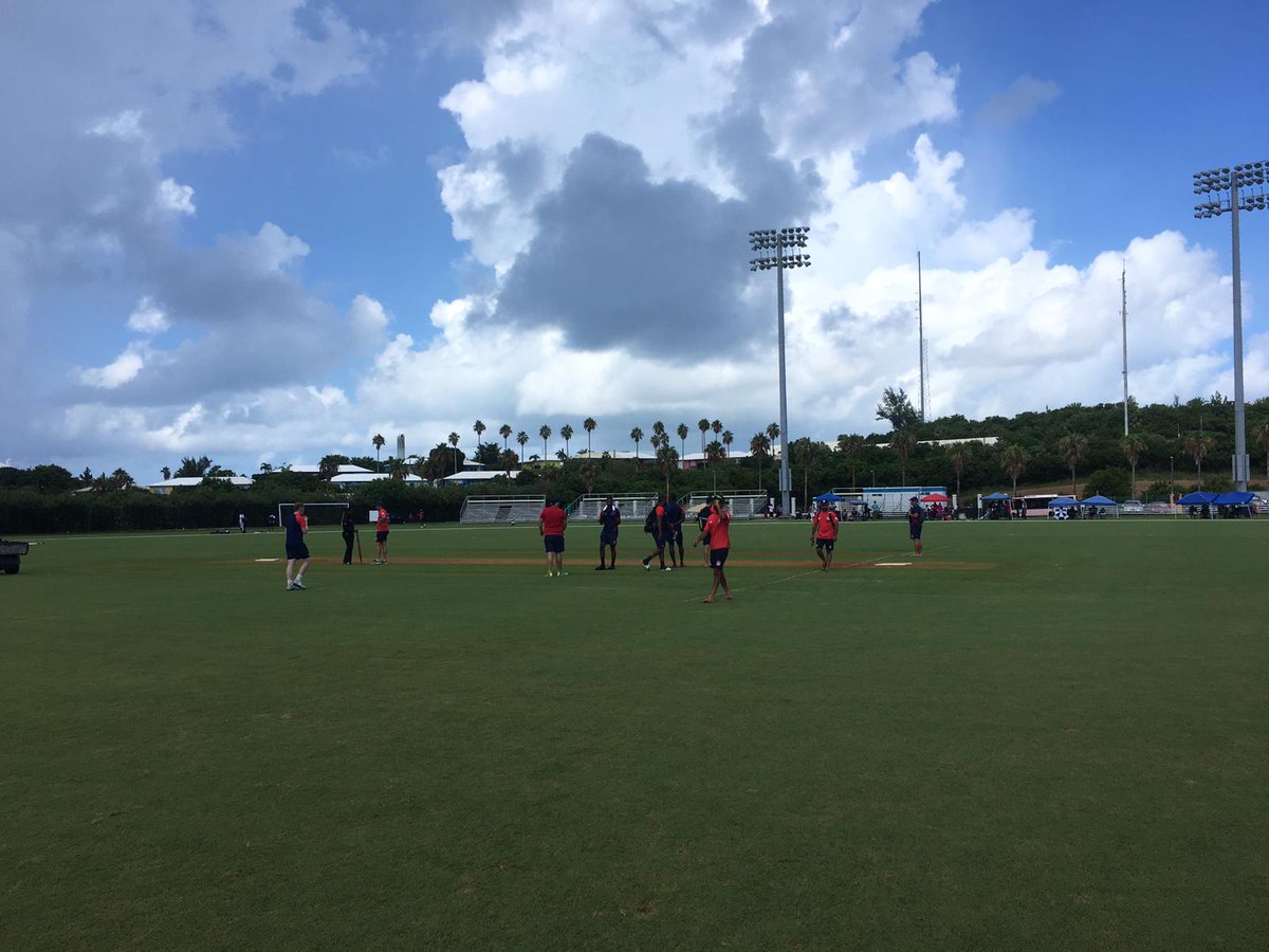 usacricket's tweet photo. Covers are off and the teams are out taking a look with the rain having relented. We're looking at a start in around 10 minutes with the toss being imminent now
Toss and teams news and more in the @USACricket Match Center➡️: https://t.co/PMQm0FCKa1
#T20WorldCup #USAvCAY🇺🇸🇰🇾 https://t.co/yk692hUle1