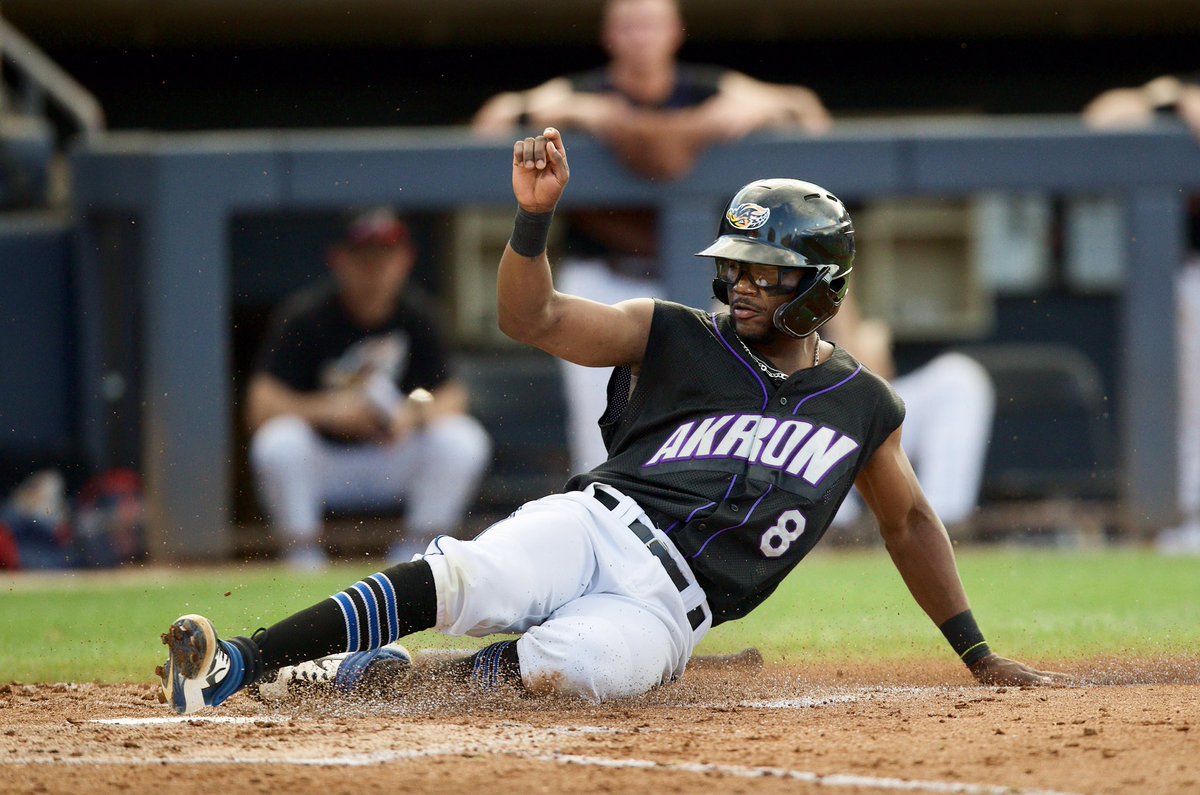 Sporting the Aeros throwback jersey,  Andruw Monasterio slides home with the <a href="/AkronRubberDuck/">Akron RubberDucks</a> 1st run! <a href="/MiLB/">Minor League Baseball</a> (David Monseur/RubberDucks)
