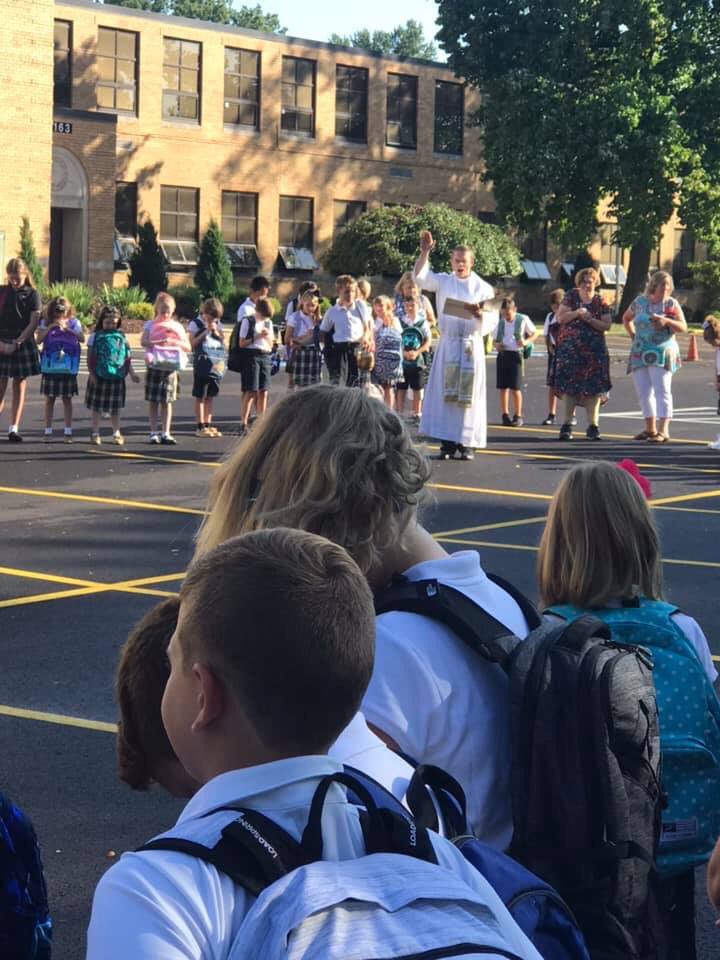 Holyfamstow's tweet photo. We had a great first day back to school today!  We started the morning off with a prayer service and Blessing of the Bookbags with Fr. Andy. We are so excited for the great year ahead!  🐾🙏🏻❤️🐾 https://t.co/ihZ5aAEnPA