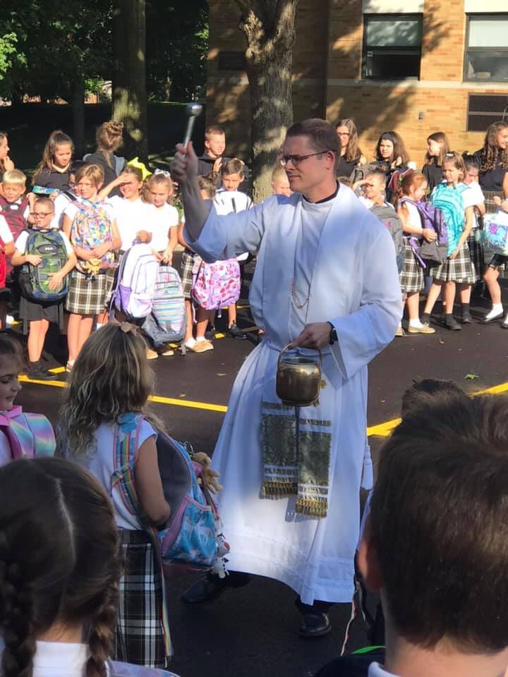 Holyfamstow's tweet photo. We had a great first day back to school today!  We started the morning off with a prayer service and Blessing of the Bookbags with Fr. Andy. We are so excited for the great year ahead!  🐾🙏🏻❤️🐾 https://t.co/ihZ5aAEnPA