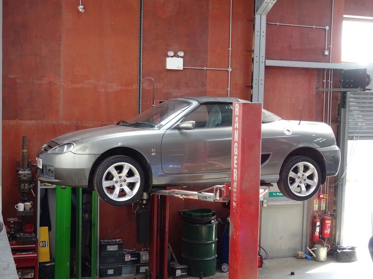 BeaconWorksh's tweet photo. Room for a little one... A lovely MG TF on the ramp for some mechanical work #beaconsfieldworkshop #mg #tf https://t.co/gc7Y7wP9G4