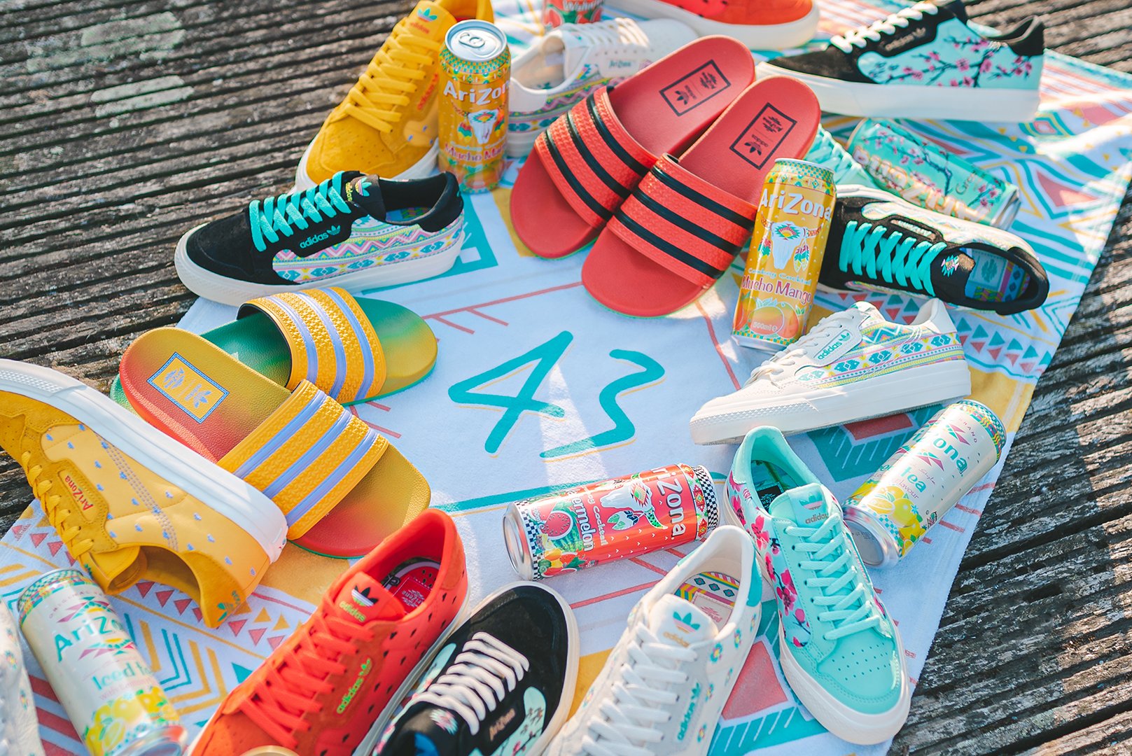 43einhalb on X: "»Who's AriZona Iced Tea and @adidasoriginals are back again! Made up of co-branded takes on the Continental Vulc plus four Adilette slides, each design interprets AriZona's